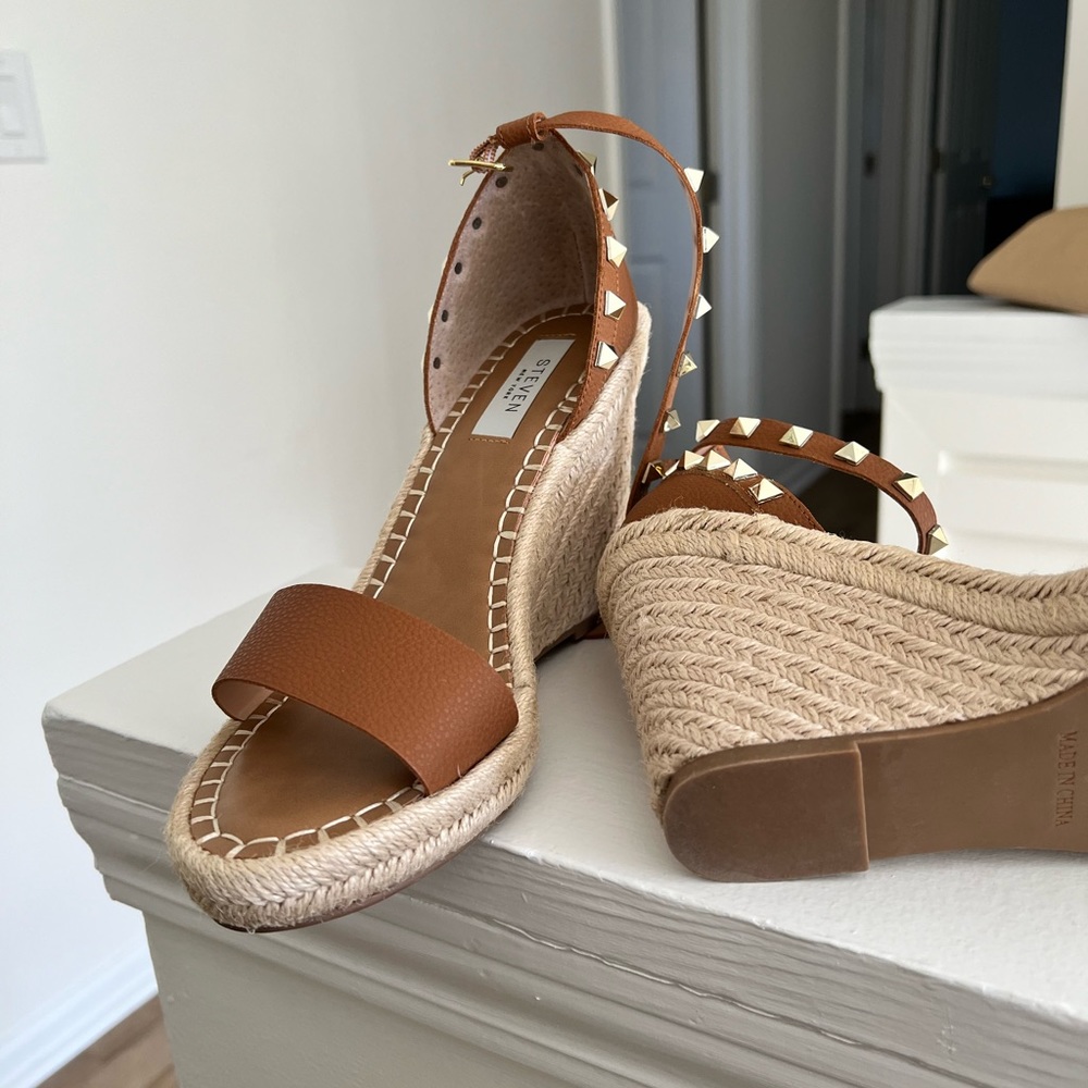 COPY - This studded twist on a classic wedge is fun flirty way to amp up your s…